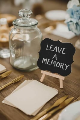 A memory-sharing moment at a celebration of life gathering — illustrative of memorial events and celebrations of life at Weir Bank Estate, Bray-on-Thames, Berkshire.